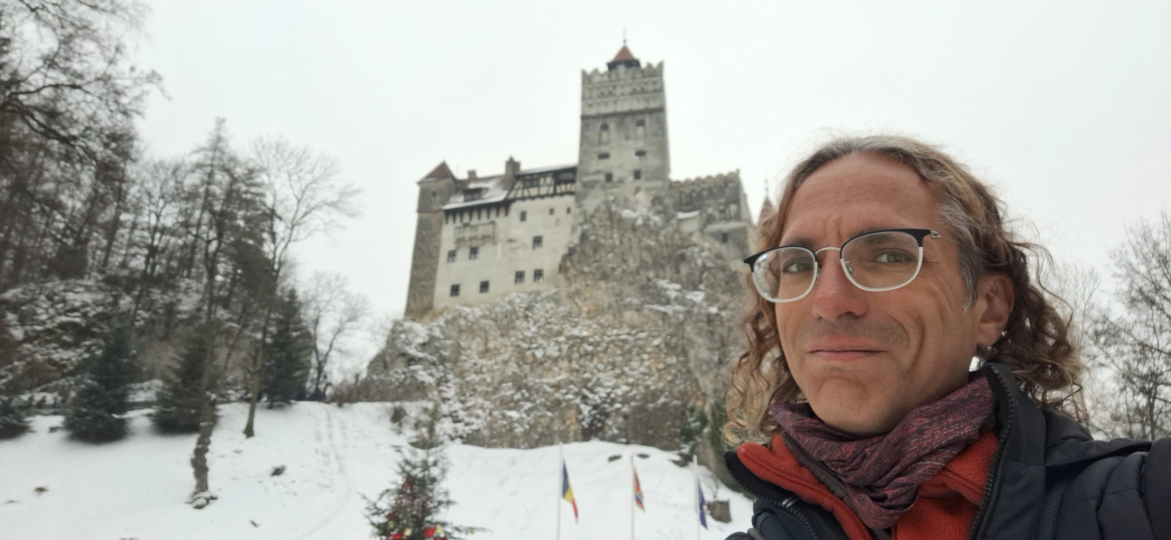 Richard Massel in front of Bran Castle in Romania during the winter.